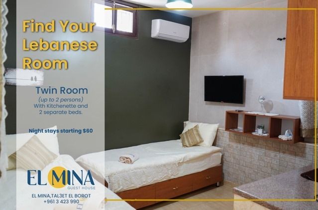 Guest room with twin beds, kitchenette, and promotional text about Lebanese room offer.